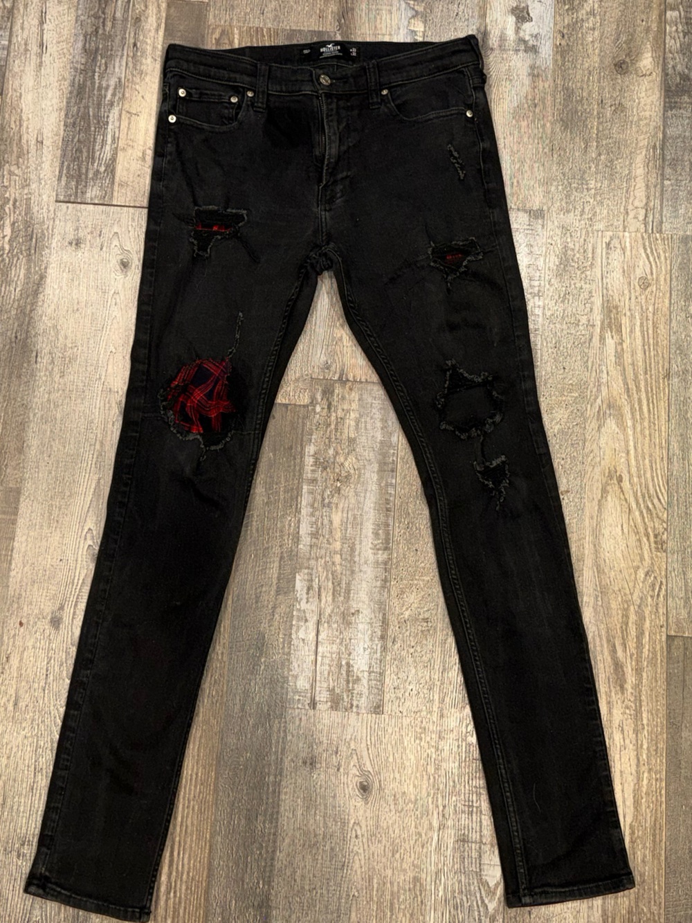 Men’s Hollister Black Stacked Skinny Jeans with Red Plaid Patch